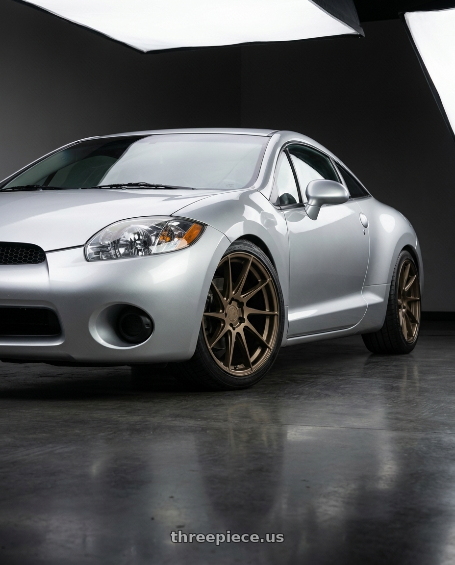 2010 Mitsubishi Eclipse with Aodhan AH09 5x114.3 18x8.5 +35 Matte Bronze wheels