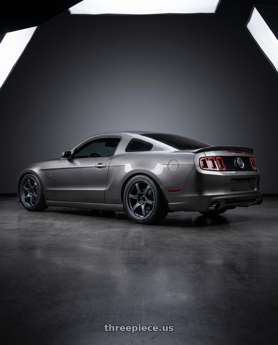 2014 Ford Mustang GT with Gram Lights 57DR 5x114.3 19x9.5+35 Gunblue II wheels rear three quarter view square tires