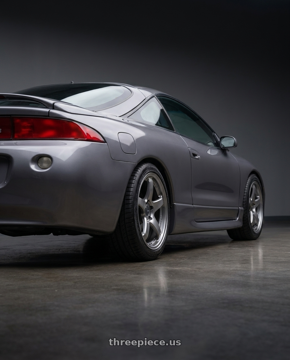1997 Mitsubishi eclipse with Enkei PF05 5x114.3 17x8.5+38 Dark Silver wheels rear three quarter view square tires