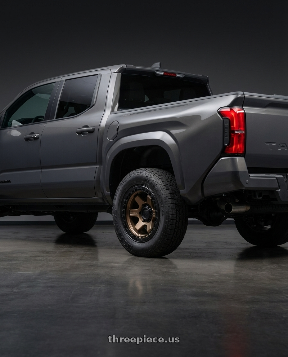 2024 Toyota Tacoma sr underground  with Fuel 1PC D124 BLOCK BEADLOCK 6X139.7 17X9 -15 MATTE BRONZE WITH MATTE BLACK RING wheels rear three quarter view square tires