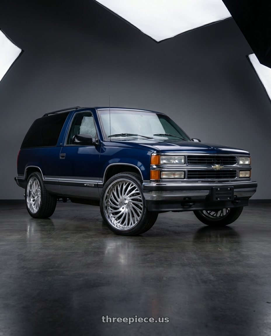 1999 Chevrolet Tahoe with Amani Vamos 5x112/5X114.3 22x9 +32 Brush Center Chrome Lip wheels