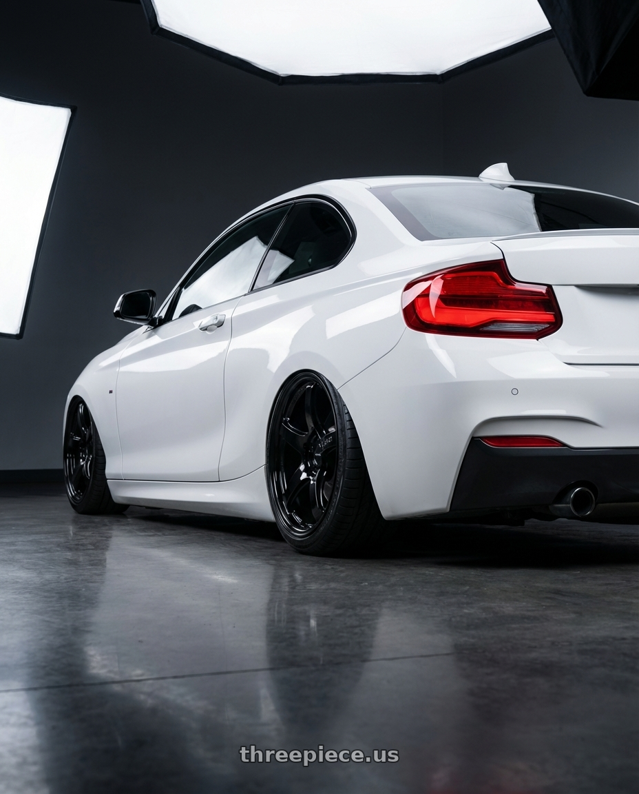 2018 BMW 2 Series F22 with Gram Lights 57CR 5x120 19x9.5+25 Glossy Black wheels rear three quarter view slight stretch tires