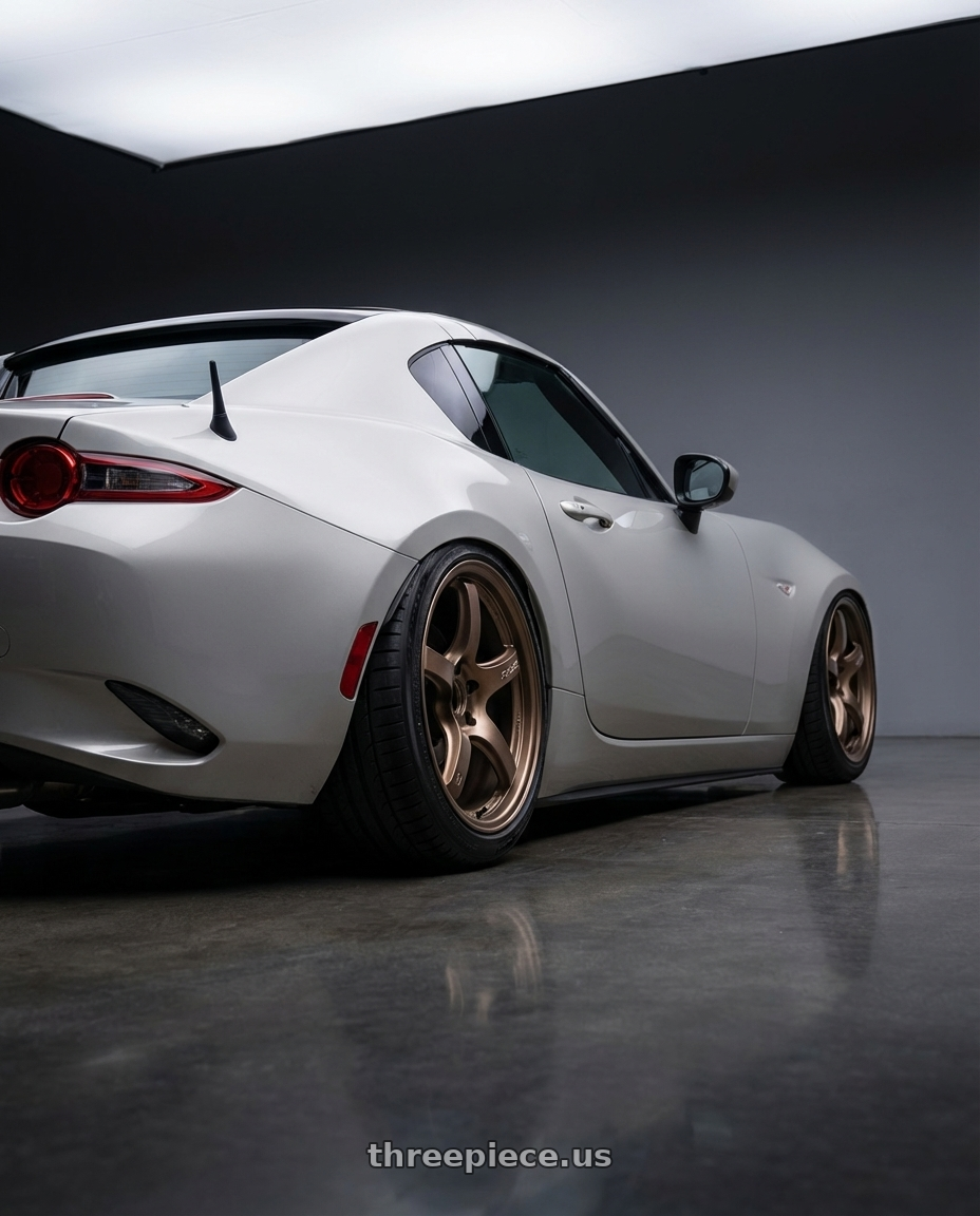 2021 Mazda MX-5 Miata ND with Gram Lights 57CR 5x114.3 17x9+38 Bronze II wheels rear three quarter view slight stretch tires