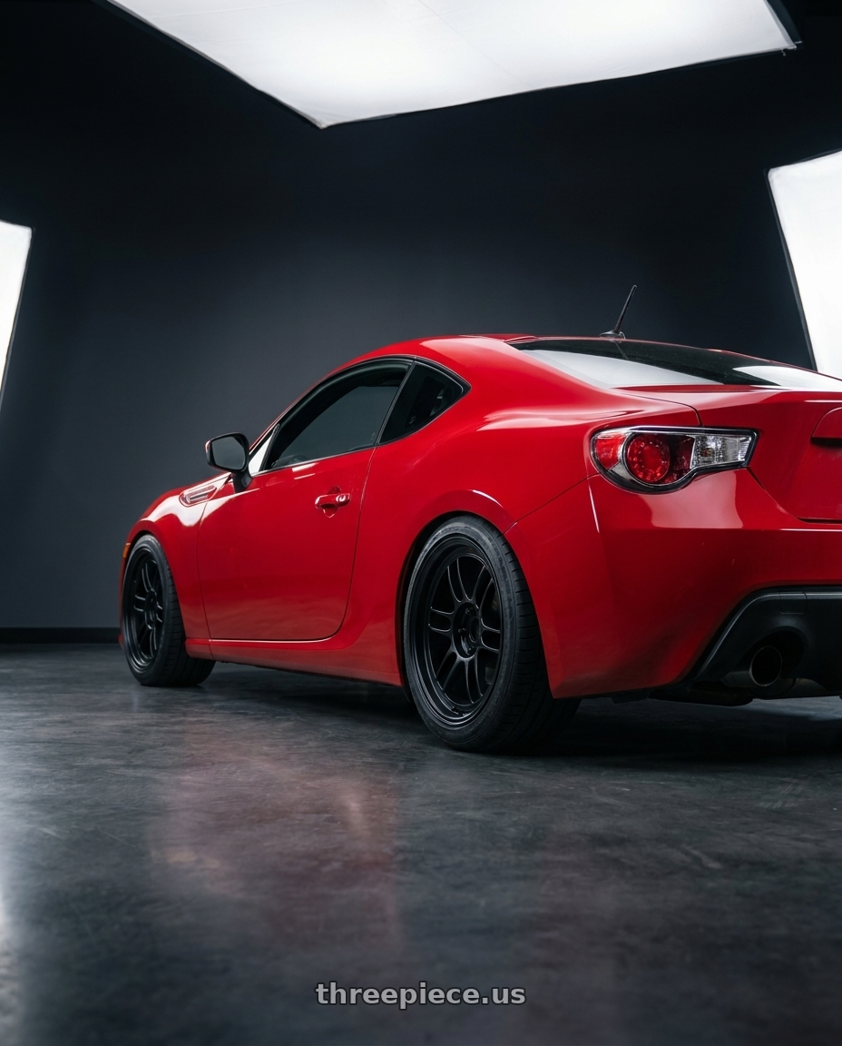 2013 subaru brz with Enkei RPF1 5x100 17x9+35 Black wheels rear three quarter view square tires