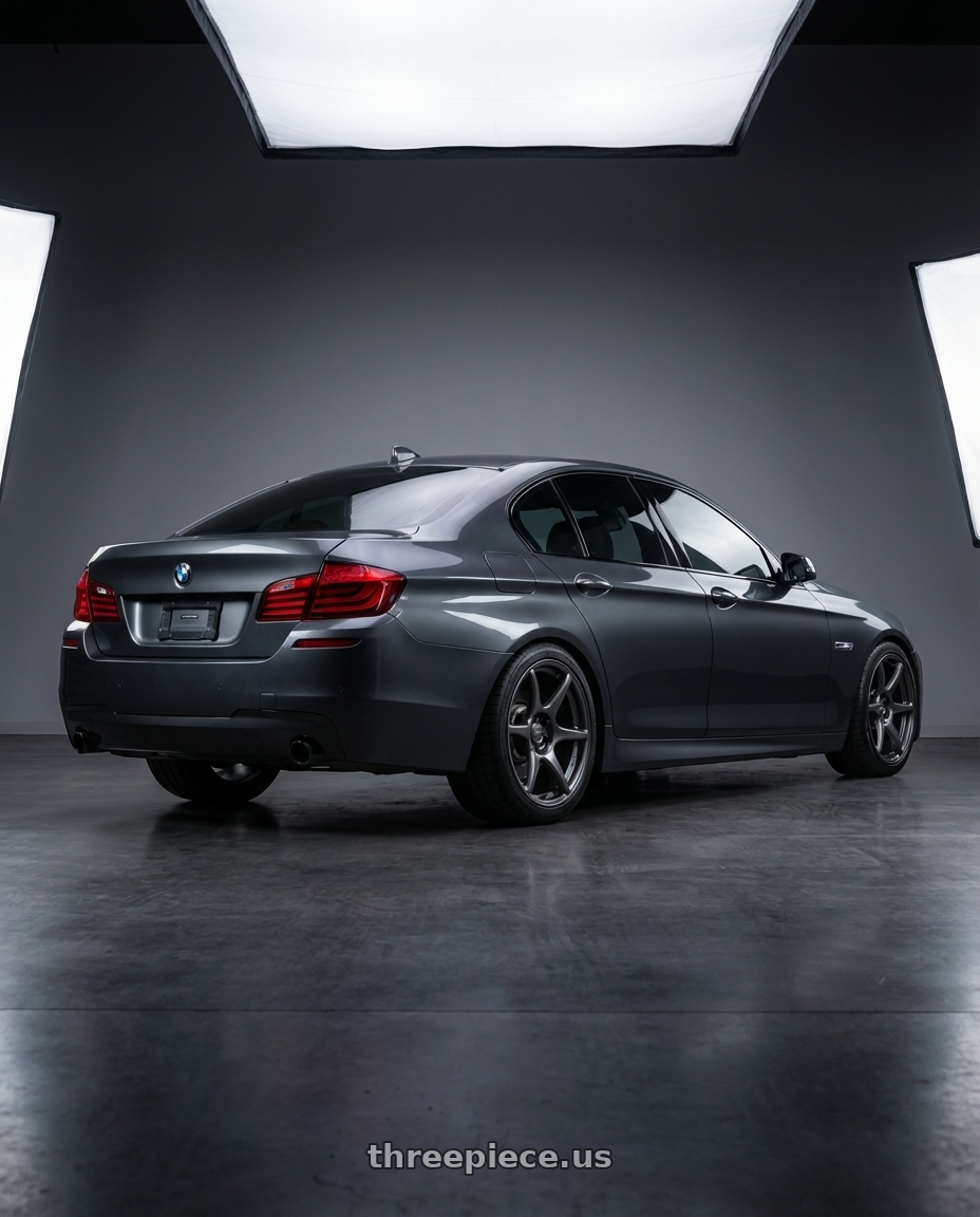 2016 BMW 5 Series F10 with Kansei K11G Tandem 5X120 19x10.5 22 Gunmetal wheels rear three quarter view square tires