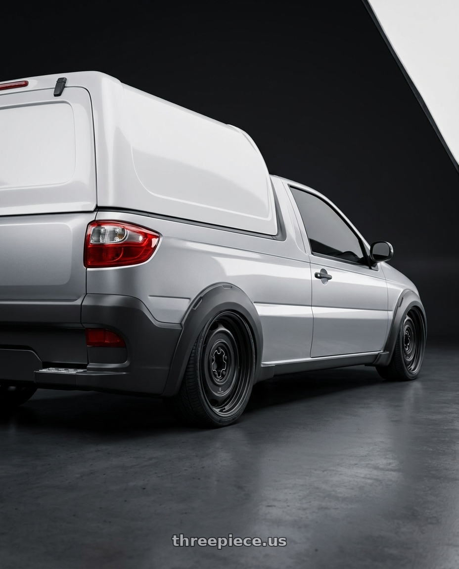 fiat strada working 2014 bau - prata with Mobelwagen MW512B Interceptor 5X112 16x7.5 23 Black wheels rear three quarter view square tires