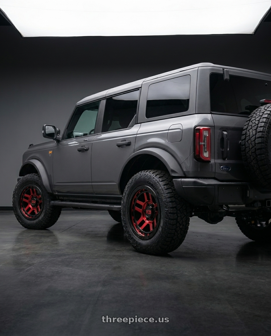 2023 Ford Bronco Badlands with XD XD140 RECON 6X139.7 17X8.5 +18 GLOSS BLACK MACHINED WITH RED TINT wheels rear three quarter view square tires