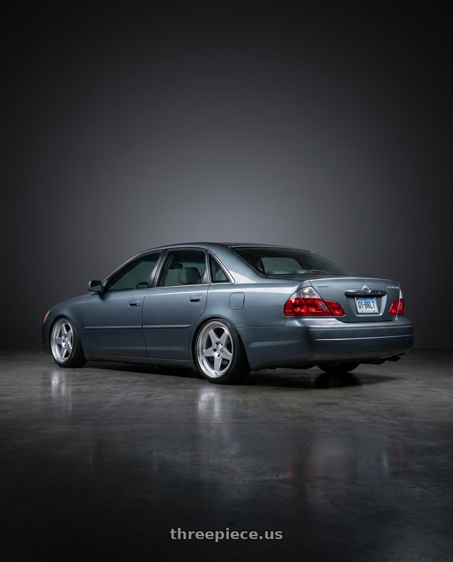 2004 toyota avaloin xls grey blue with Kansei K12H KNP 5X100 18x9 35 Hyper Silver wheels rear three quarter view slight stretch tires
