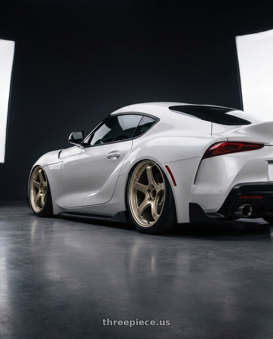 2023 toyota supra with Advan Racing GT BEYOND 5x112 20x11.0 +35 RACING SAND METALLIC wheels rear three quarter view slight stretch tires
