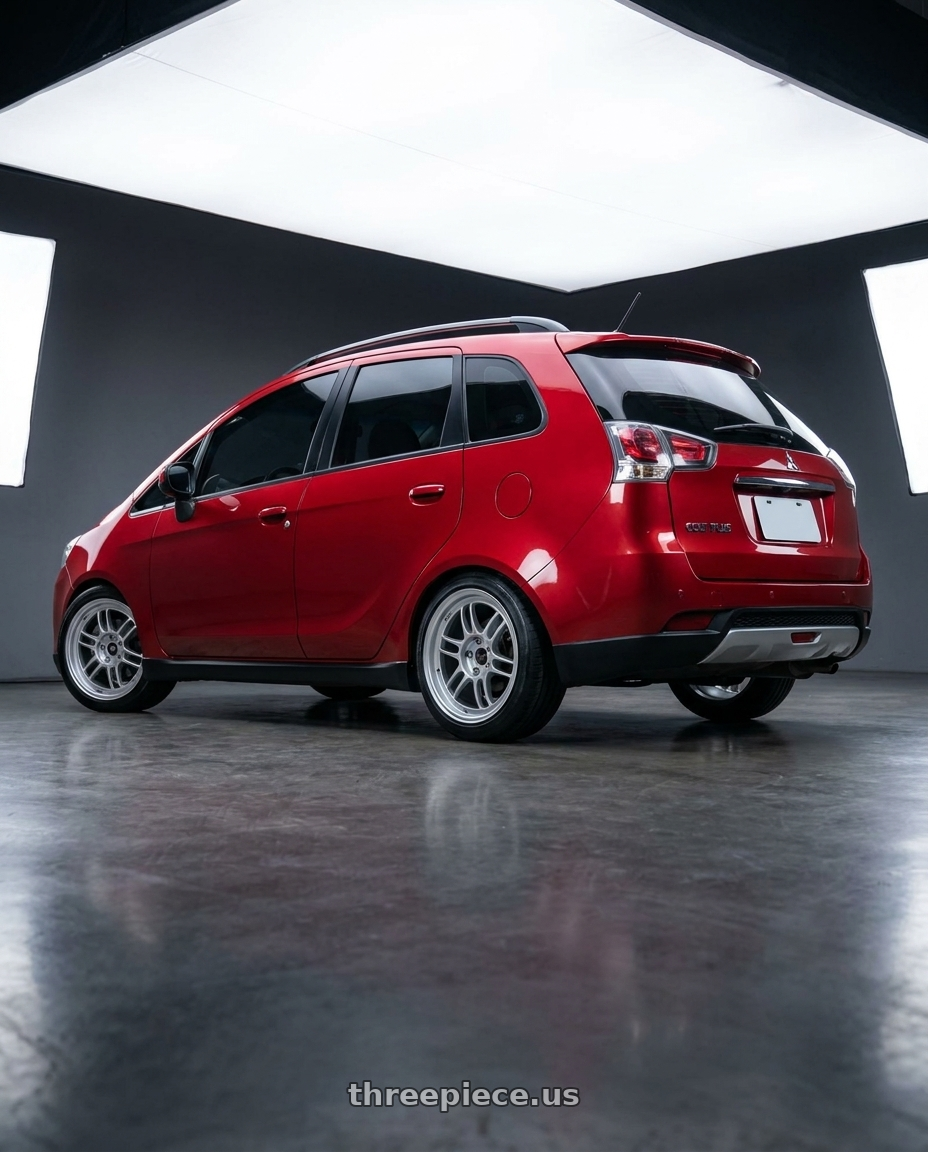 2025 mitsubishi colt plus Red with Enkei RPF1 5x114.3 17x8+45 Silver wheels rear three quarter view slight stretch tires