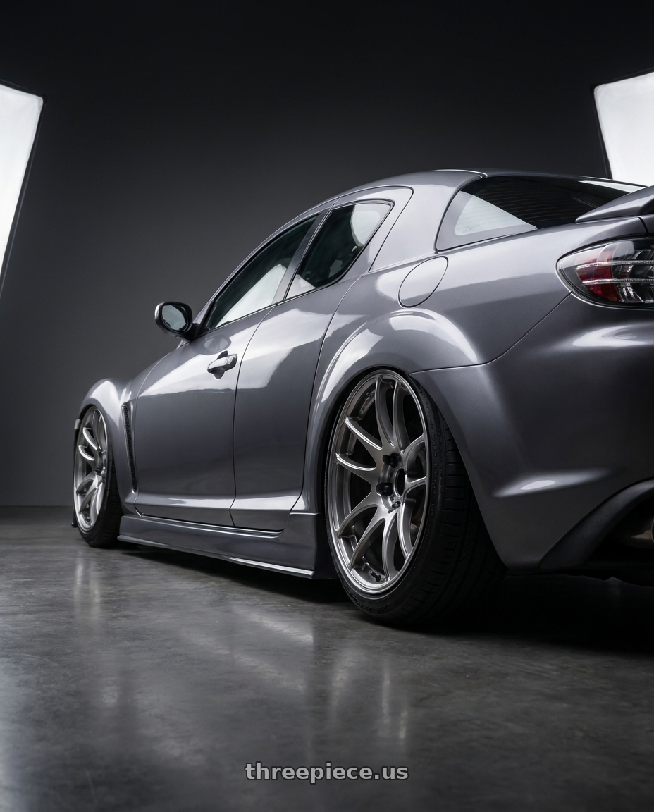 2006 Mazda RX-8 with Work Emotion Cr Kiwami 5x114.3 18x8.5 +38 Gt Silver wheels rear three quarter view slight stretch tires