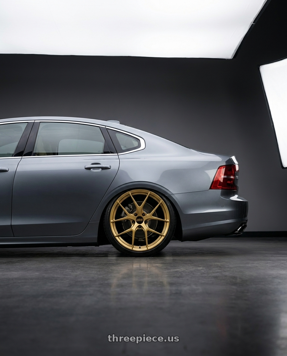 2020 Volvo s90 with BBS FI-R 5x114.3 20x8.5+51.5 Gold wheels rear three quarter view slight stretch tires