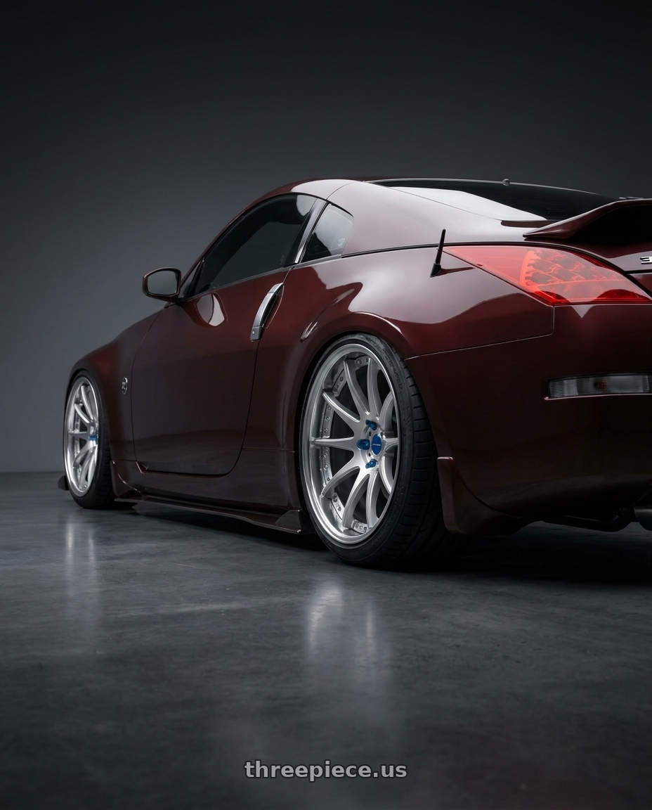 2006 Nissan 350Z with Work Emotion CR 3P wheels rear three quarter view meaty tires