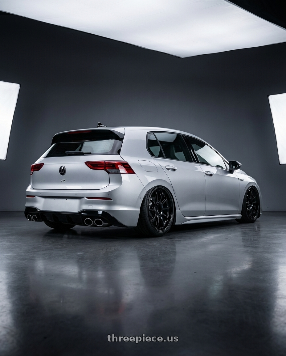 2024 Volkswagen Golf R MK8 with Advan Racing RS-DF Progressive 5x112 19x8.5+45 Racing Titanium Black wheels rear three quarter view slight stretch tires