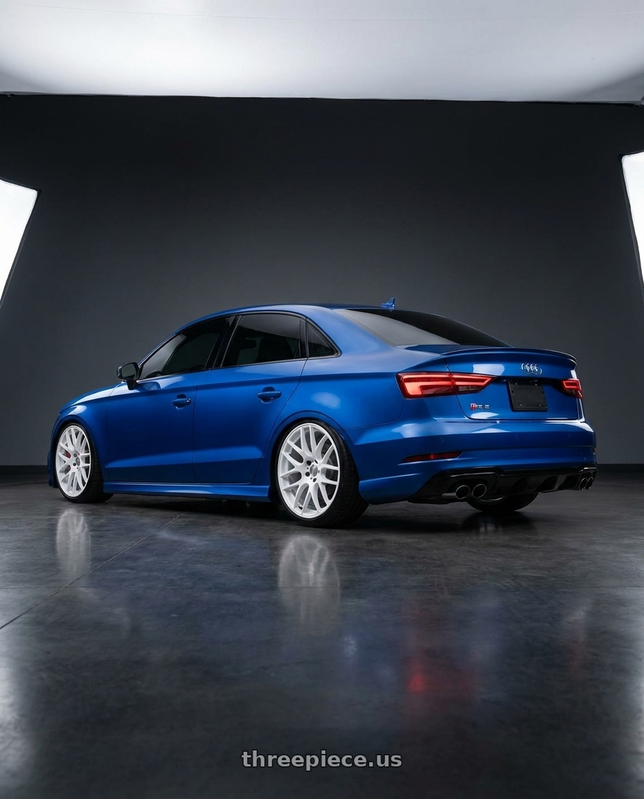 2017 Audi RS3 with Work Emotion m8r 5x112 19x9.5 +38 White wheels rear three quarter view slight stretch tires
