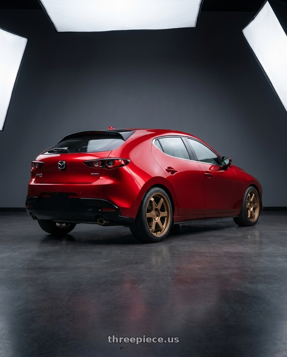 2024 Mazda 3 with 9six9 SIX-1 5x114.3 19X8.5 +35 Matte Bronze wheels rear three quarter view slight stretch tires