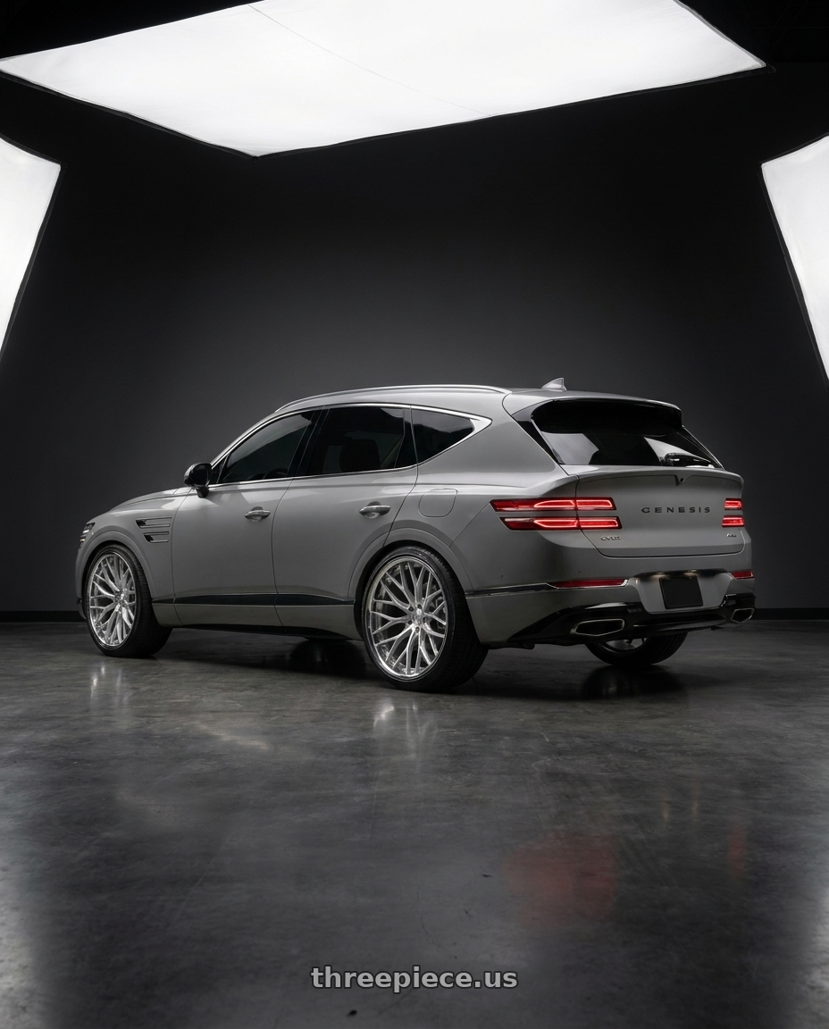 2027 Genesis GV80 Advanced with Rohana RFC10 5x114.3 22x9+35 Machine Silver/Chrome Lip wheels rear three quarter view slight stretch tires