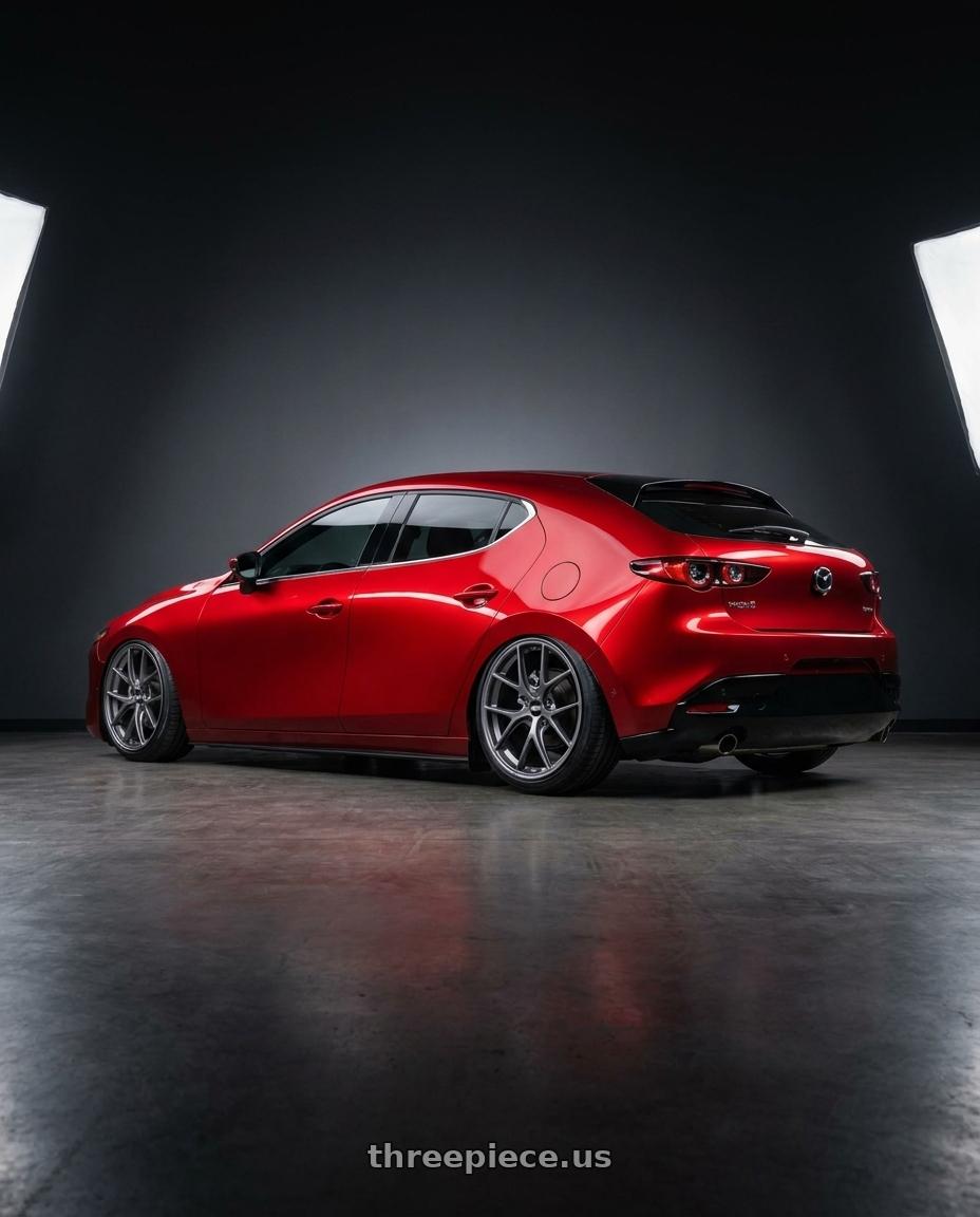 2024 Mazda 3 with BBS FI 5x114.3 20x8.75 +44 Titanium wheels rear three quarter view extreme stretch tires