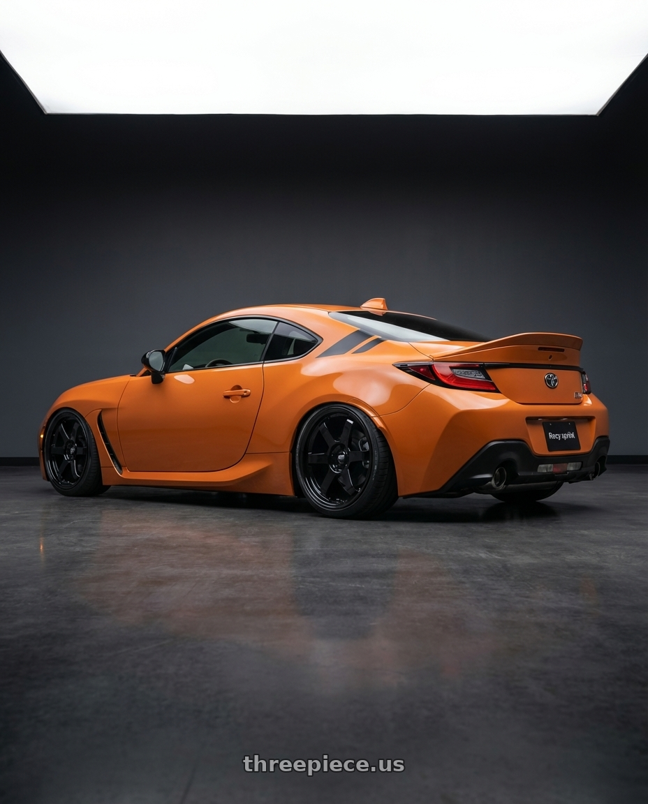 2023 gr86 10th Anniversary  with MST Wheels Time Attack 5X114.3 18X9.5 +40 Glossy Black wheels rear three quarter view slight stretch tires