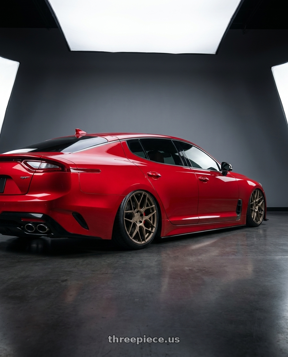 2022 Kia Stinger GT with Aodhan AFF2 5x114.3 19x9.5+35 Matte Bronze wheels rear three quarter view slight stretch tires