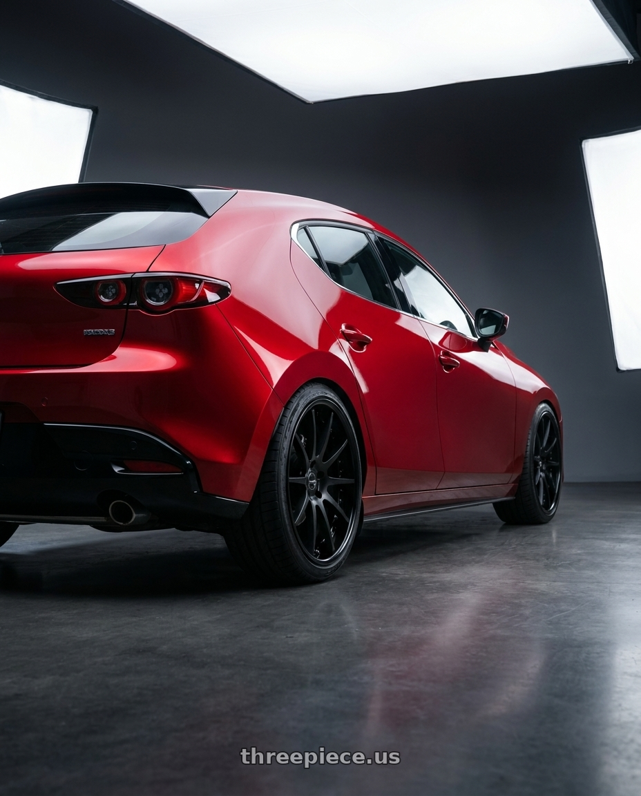 2024 Mazda 3 with EXECUTOR CV01 5X112 19X9+-2 HP Disk Flat Black wheels rear three quarter view slight stretch tires