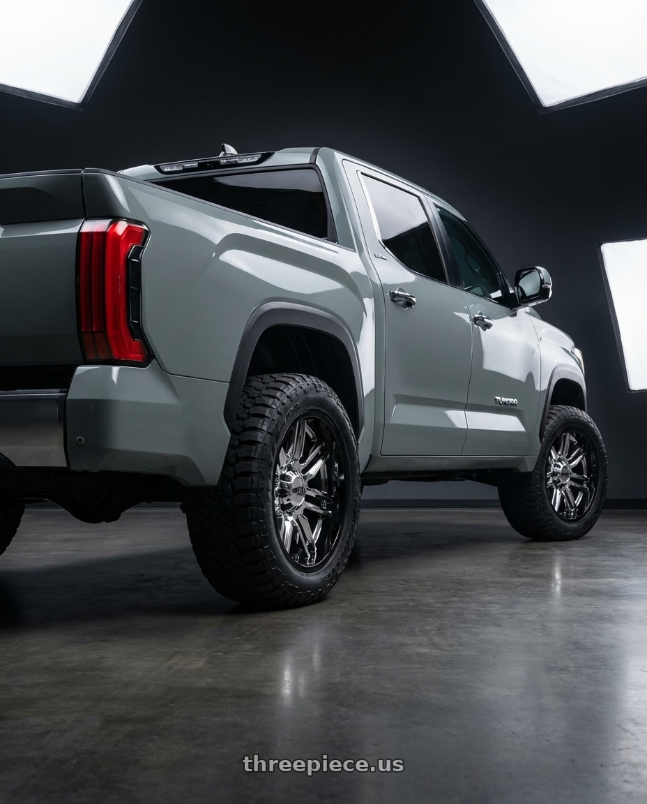 2024 Toyota Tundra with Moto Metal MO202 6X139.7 20X10 -18 CHROME CENTER GLOSS BLACK MILLED LIP wheels rear three quarter view meaty tires