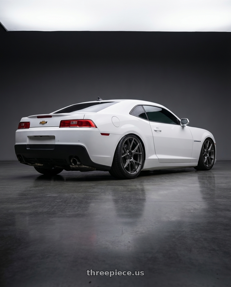 2014 Chevrolet Camaro 5th Gen with Konig Ampliform 5x120 20x8.5+45 Dark Metallic Graphite wheels rear three quarter view slight stretch tires