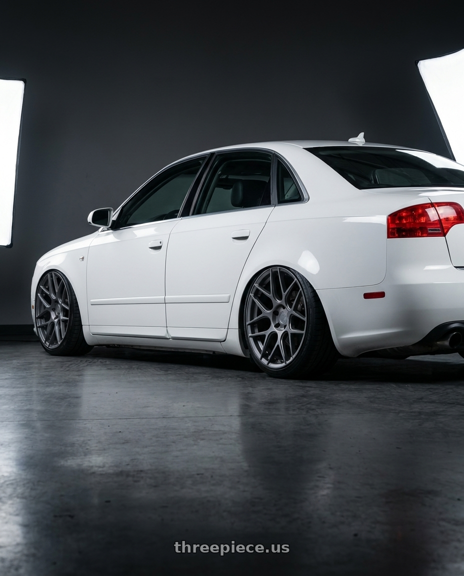 2010 Audi A4 B7 with Aodhan AFF2 5x112 19x8.5+35 Matte Gray wheels rear three quarter view slight stretch tires