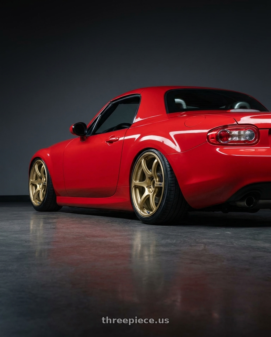2012 Mazda MX-5 Miata NC with Advan RGIII 5x114.3 17x9.0+45 Gold wheels rear three quarter view slight stretch tires