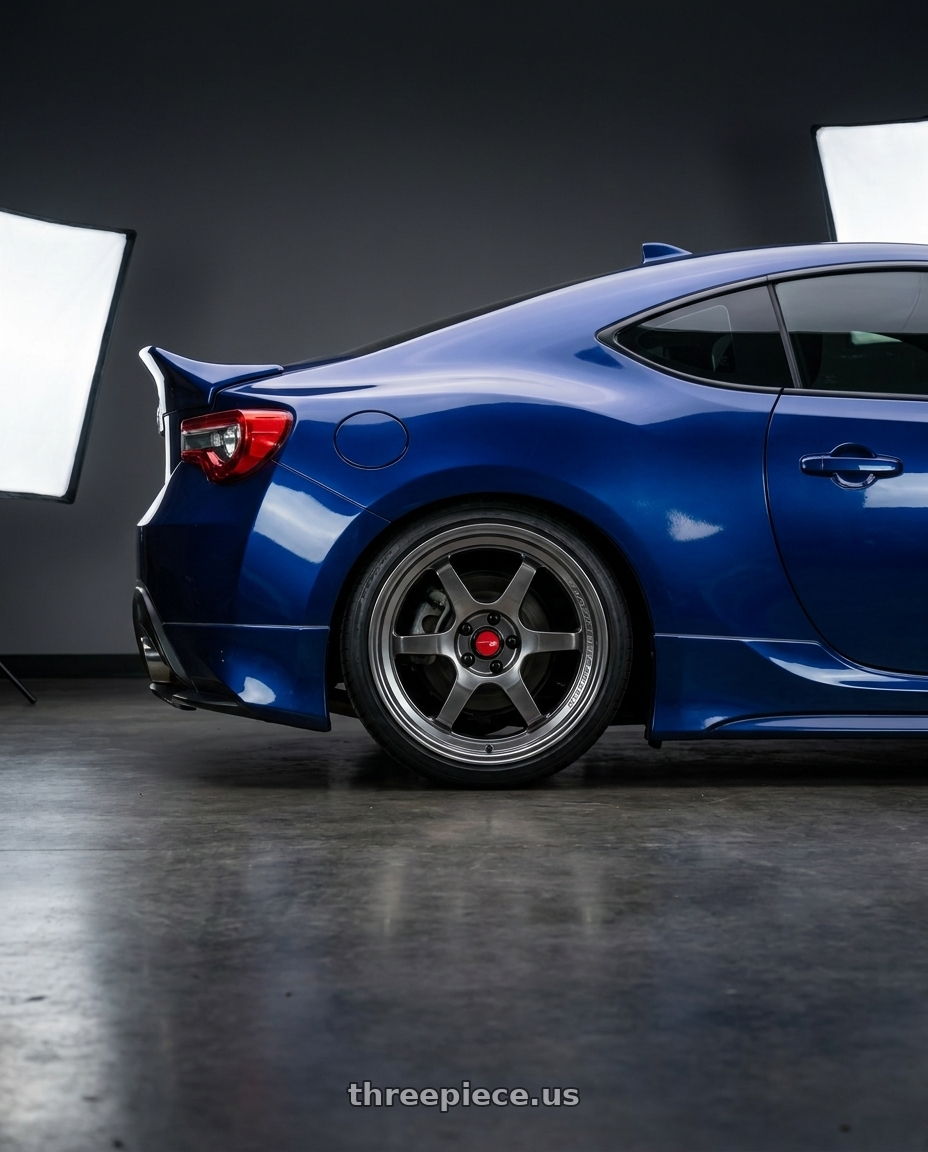 2017 Toyota 86 blue with Aodhan AH08 5x100 18x8.5+35 Hyper Black wheels rear three quarter view square tires