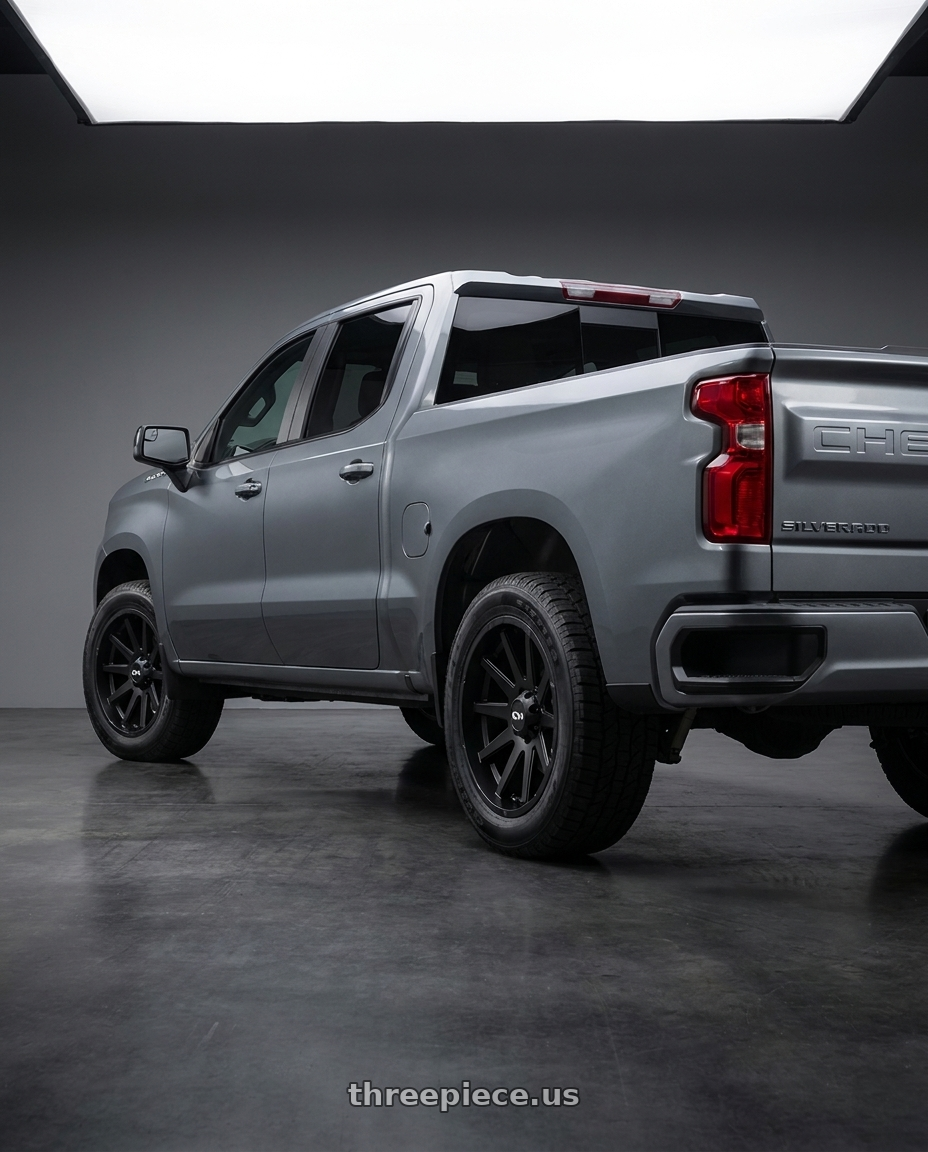 2021 Chevrolet Silverado 1500 LT with Ion Type 143 6x139.7 18x9+18 Matte Black wheels rear three quarter view square tires