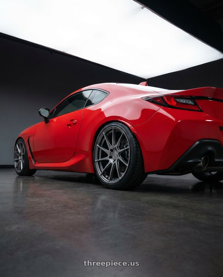 2024 Toyota GR86 with Aodhan AH09 5x114.3 18x9.5 +35 Hyper Black wheels rear three quarter view square tires