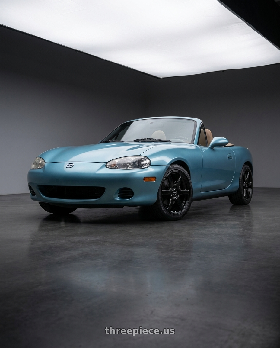 2002 Mazda Miata with Raceline 146B Matrix 4X100/4x114.3 15x7 40 Gloss Black wheels