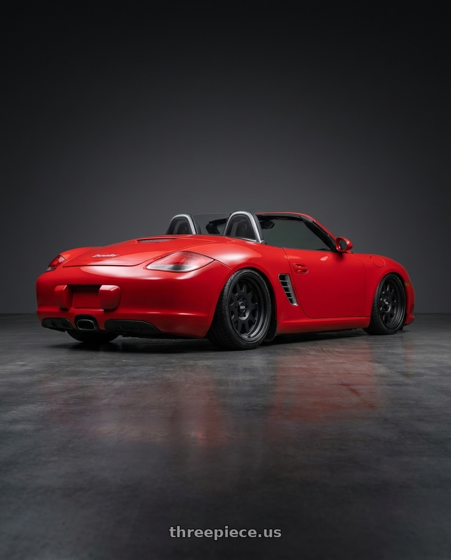 2009 Porsche Boxster with Black Rhino STADIUM 5X130 17X8 +45 MATTE BLACK wheels rear three quarter view slight stretch tires