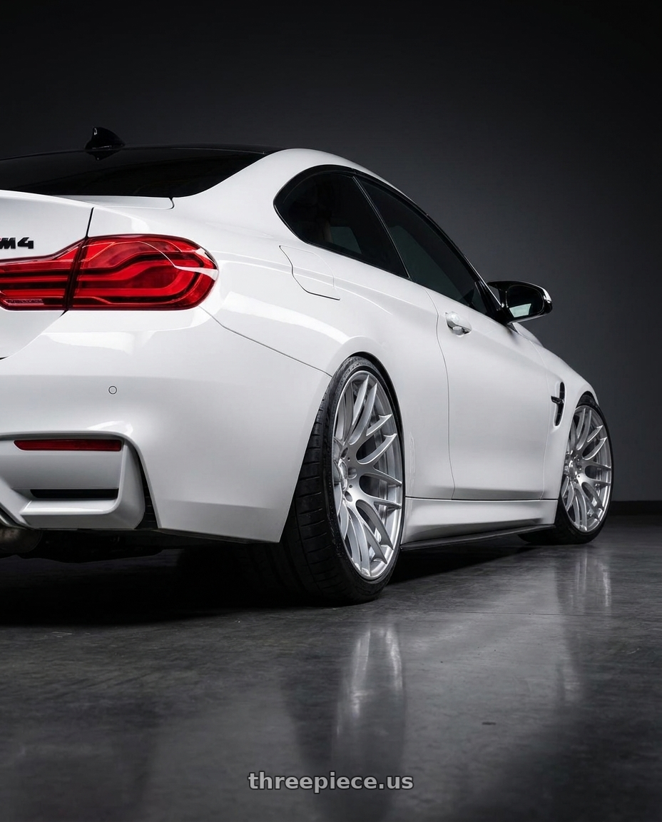 2018 BMW M4 F82 with Avant Garde Wheels M359 5X120 19x10 +25 Hyper Silver wheels rear three quarter view slight stretch tires