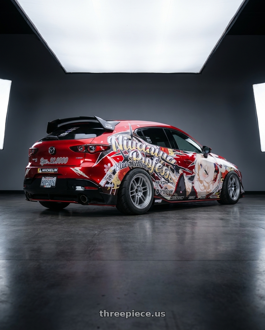 2026 mazda 3 with Enkei RPF1 5x114.3 16x7+43 Silver wheels rear three quarter view meaty tires