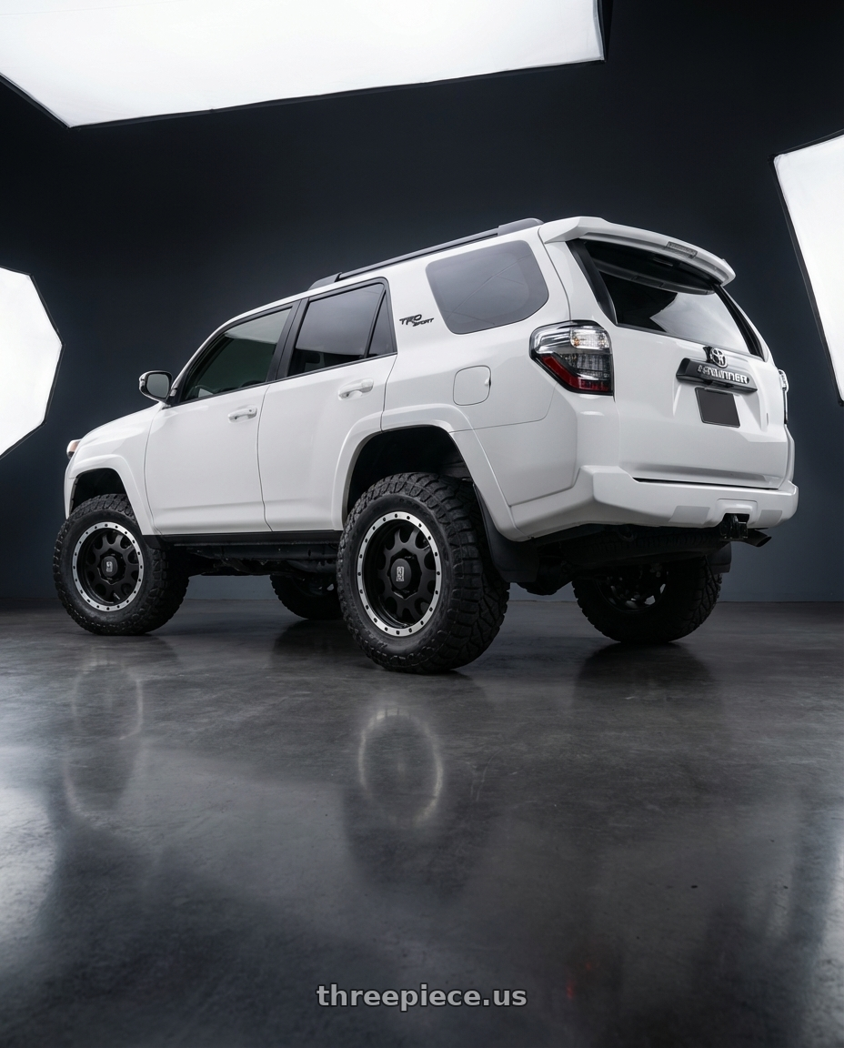 2022 Toyota 4Runner with XD XD125 6X139.7 20X9 +18 MATTE BLACK WITH MACHINED REINFORCING RING wheels rear three quarter view meaty tires