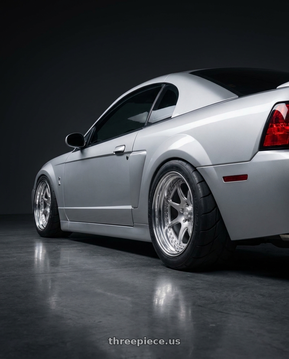 2004 Ford Mustang with CCW CZ08 4x100 16x10 +22 Polished wheels rear three quarter view meaty tires