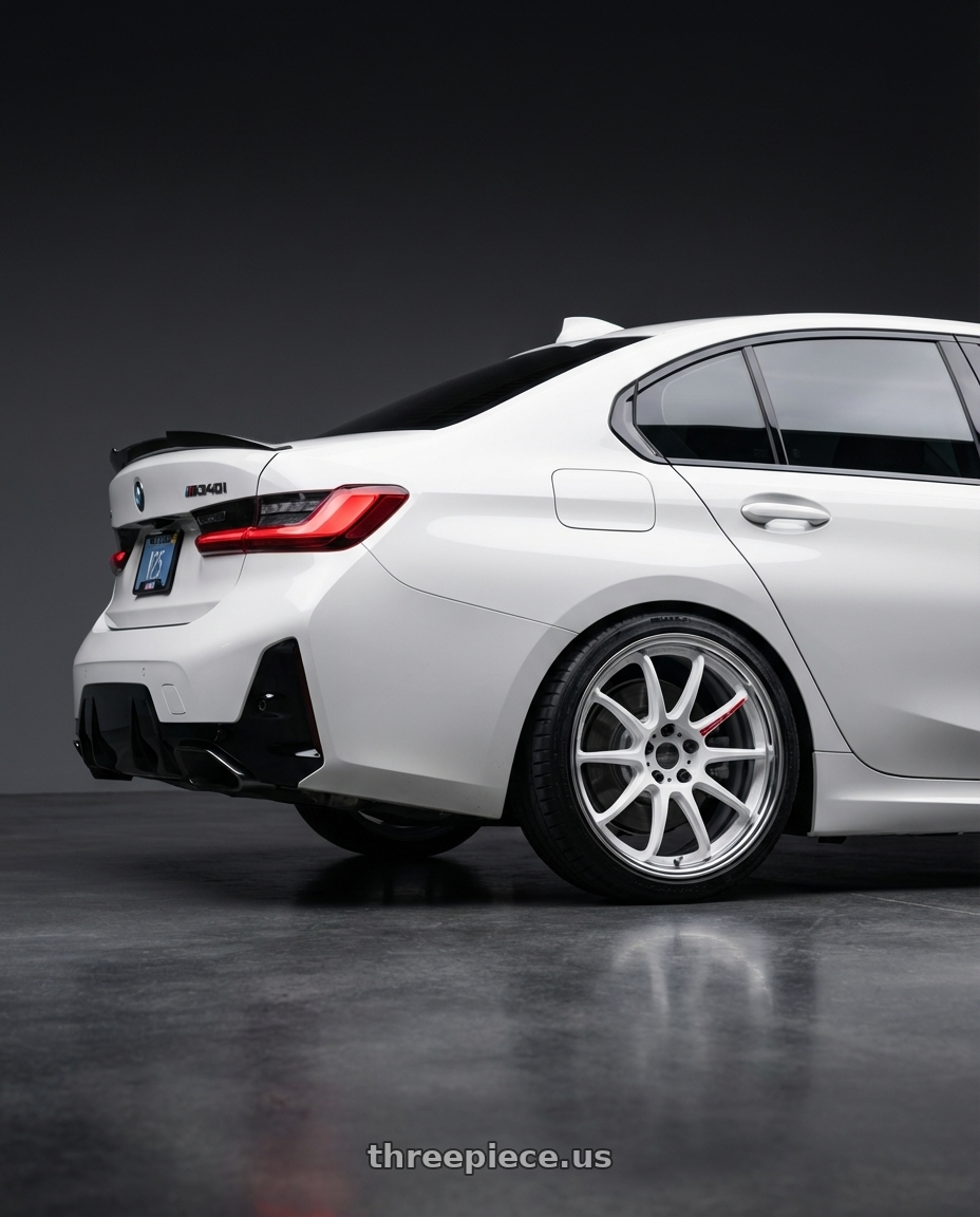 2024 BMW M340i with Work Zr10 2P 5x112 19x9.0 +38 Azure White wheels rear three quarter view square tires