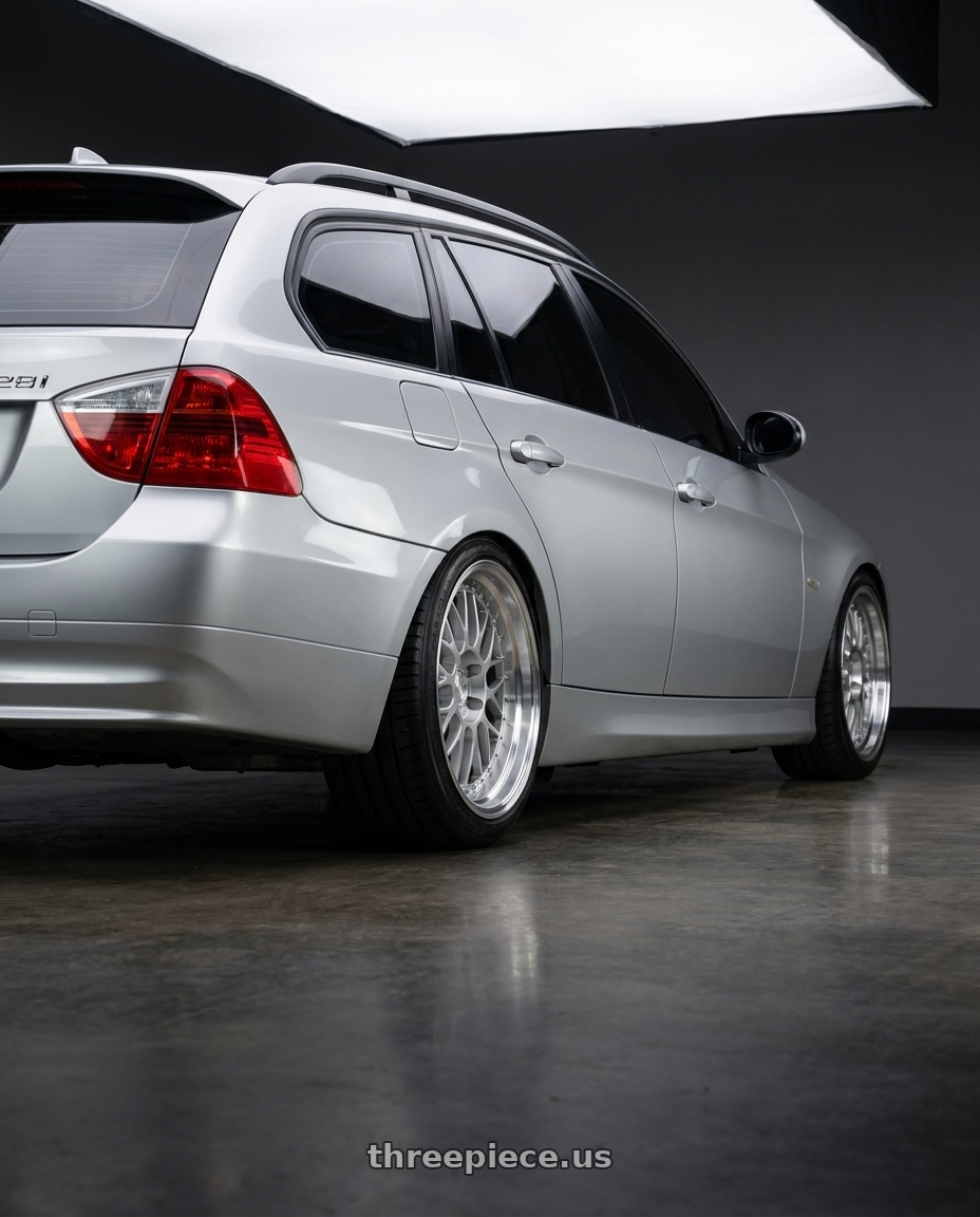 2006 BMW e91 xdrive 328i with Aodhan AH02 5x100 18x9.5+35 Silver w/ Machined Lip wheels rear three quarter view square tires