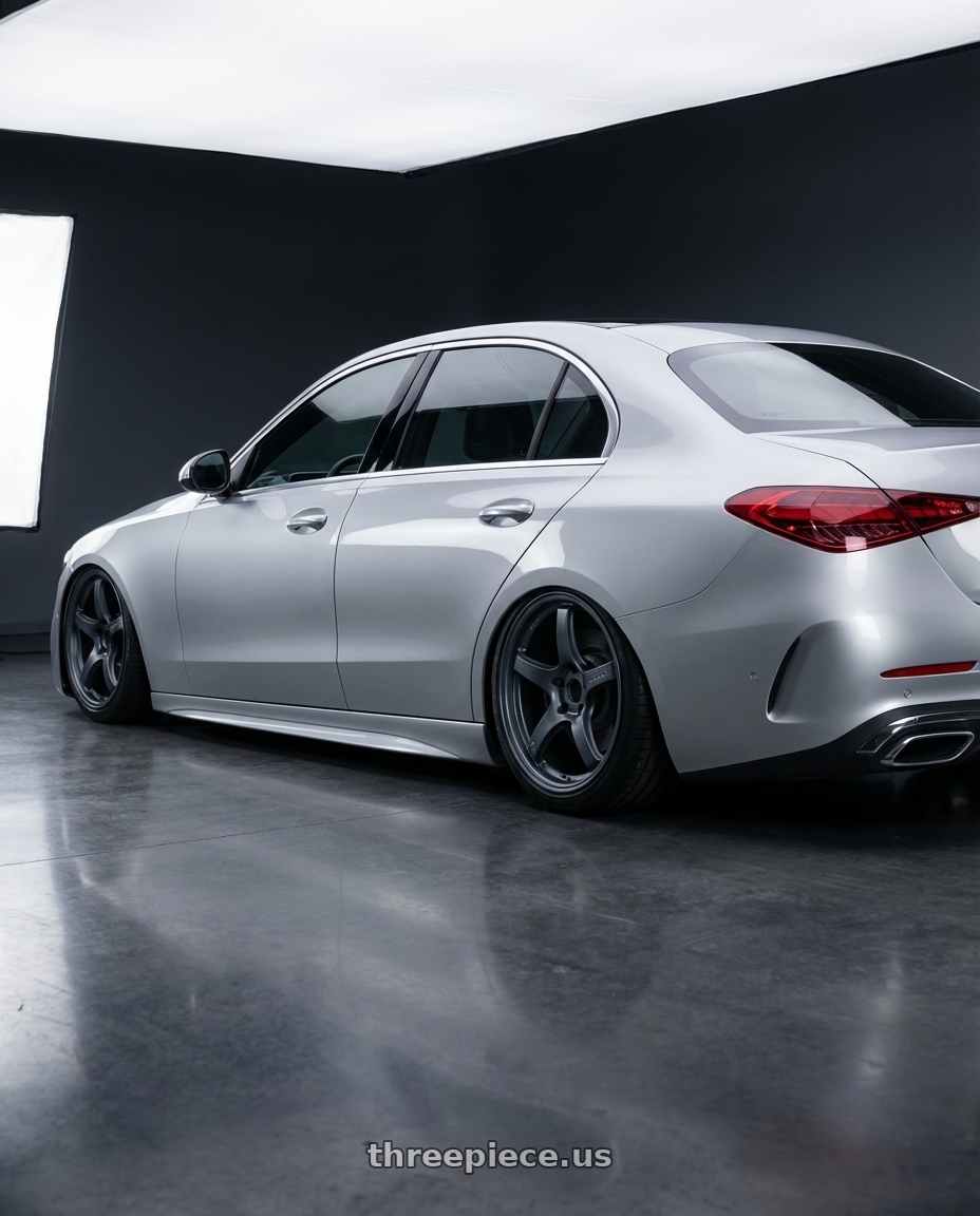 2022 Mercedes-Benz C-Class W206 with Gram Lights 57CR 5x112 19x10.5+22 Gunblue II wheels rear three quarter view slight stretch tires