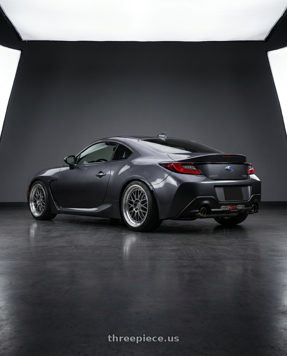 2023 Subaru BRZ premium with Aodhan AH02 5x100 18x9.5+35 Hyper Black w/ Machined Lip wheels rear three quarter view square tires
