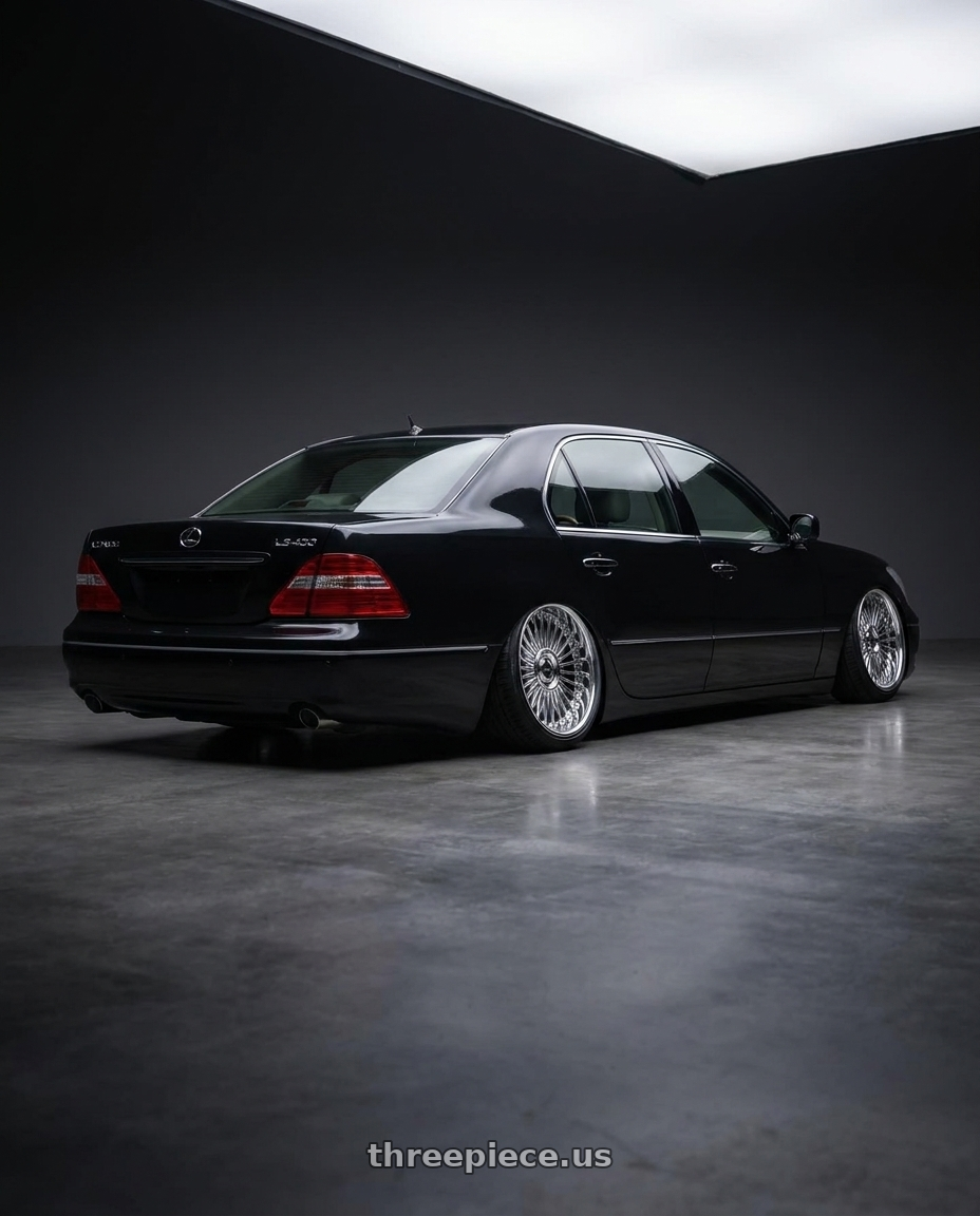 2004 Lexus LS430 Black with Work Emitz wheels rear three quarter view slight stretch tires