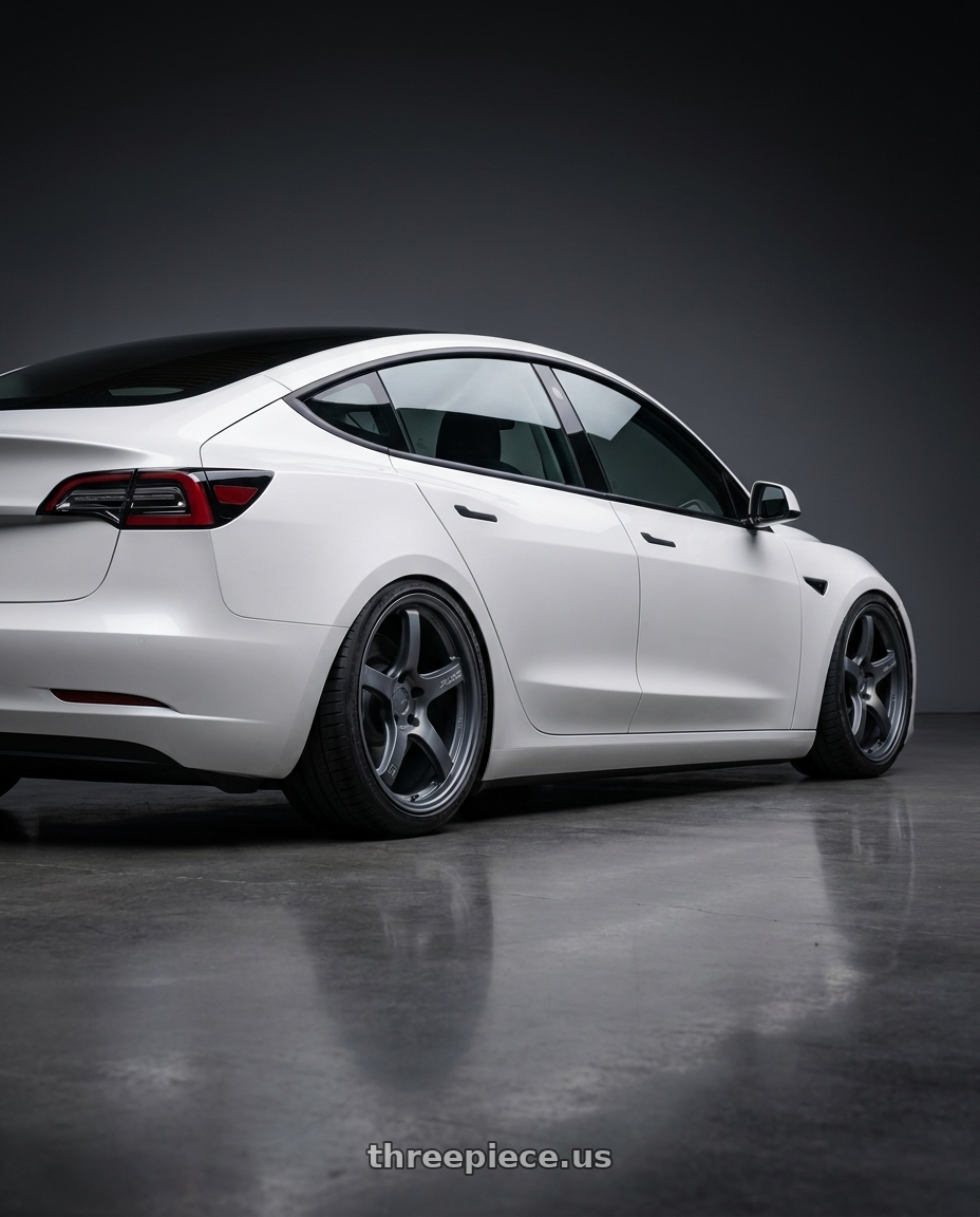 2023 Tesla Model 3 with Gram Lights 57CR 5x114.3 19x8.5+35 Gunblue II wheels rear three quarter view slight stretch tires
