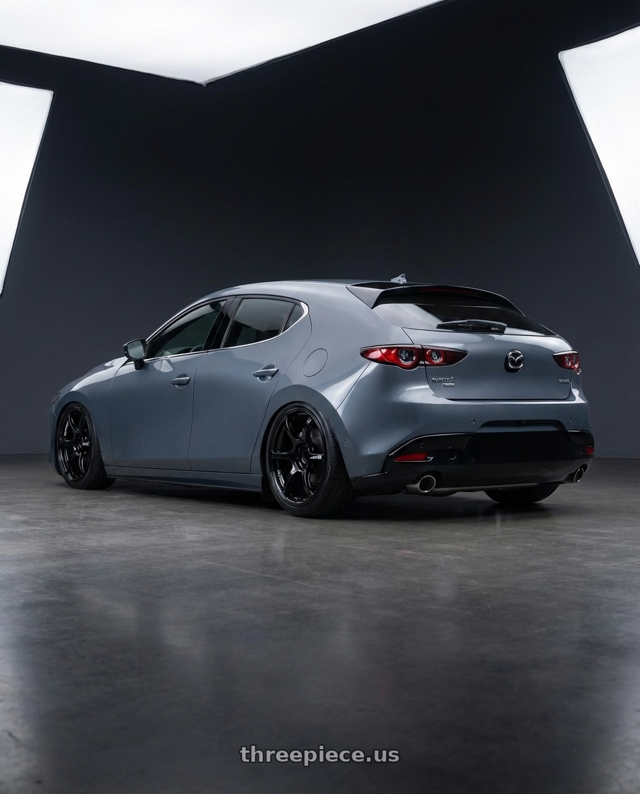 2023 Mazda Mazda3 Turbo with Advan RGIII 5x114.3 18x8.5+31 Gloss Black wheels rear three quarter view slight stretch tires