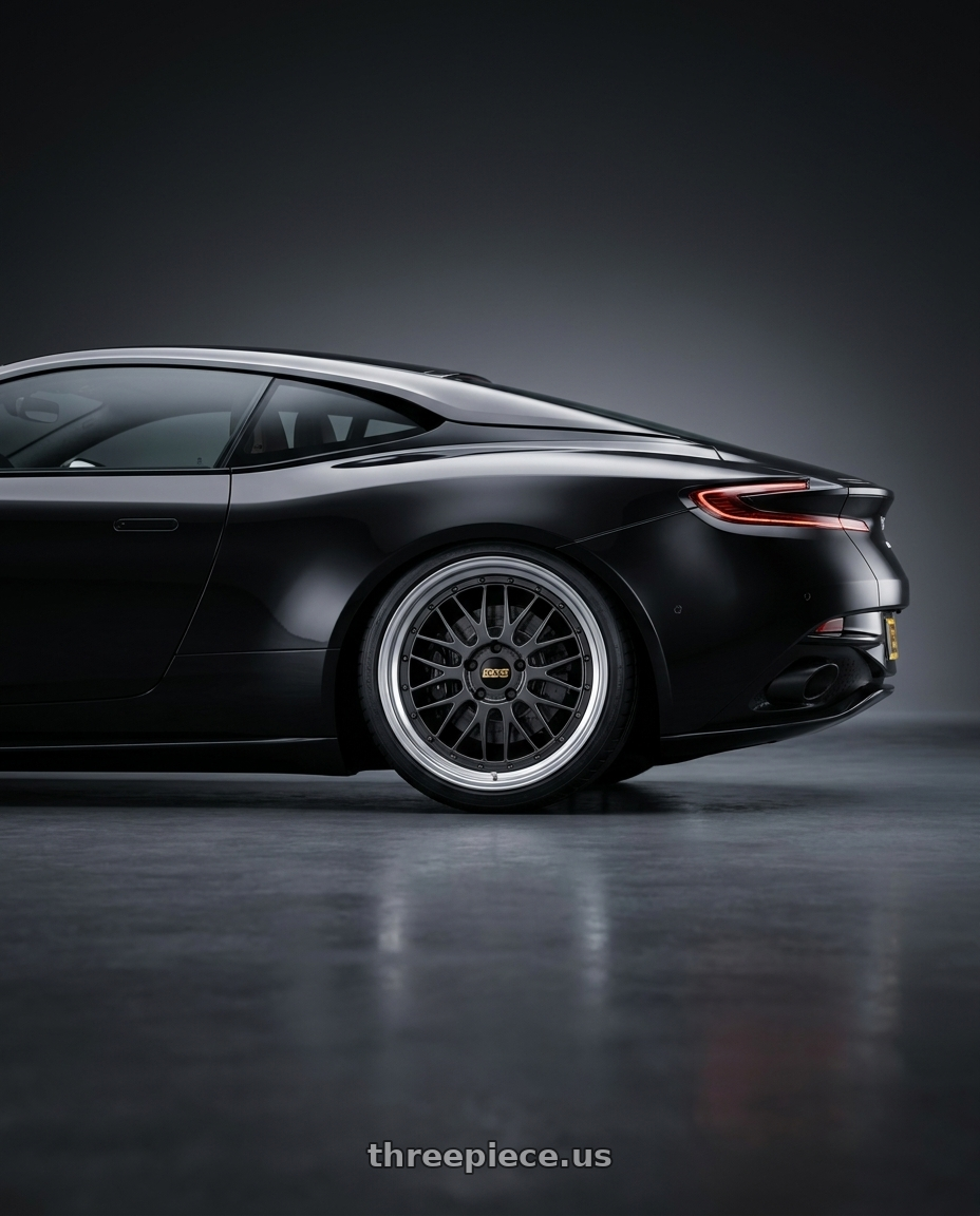 2019 Aston Martin DB11 with BBS LM 5x114.3 18x8.5+38 Diamond Black wheels rear three quarter view slight stretch tires