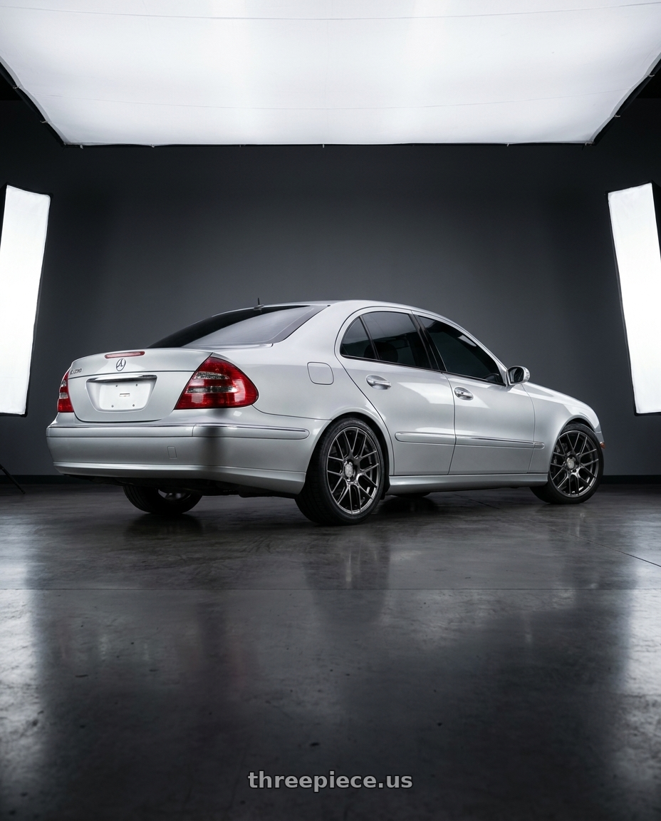 2003 Mercedes Benz E320 Sport with Aodhan AH-X 5x112 18x8.5+35 Hyper Black wheels rear three quarter view square tires