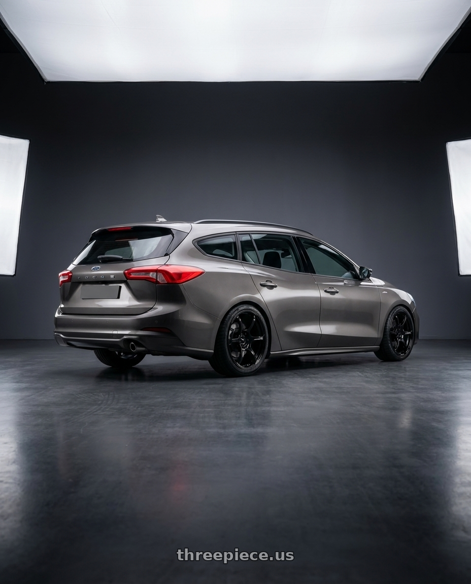 2024 Focus Wagon Mk45 with Advan RGIII 4x100 18x7.0+42 Gloss Black wheels rear three quarter view square tires