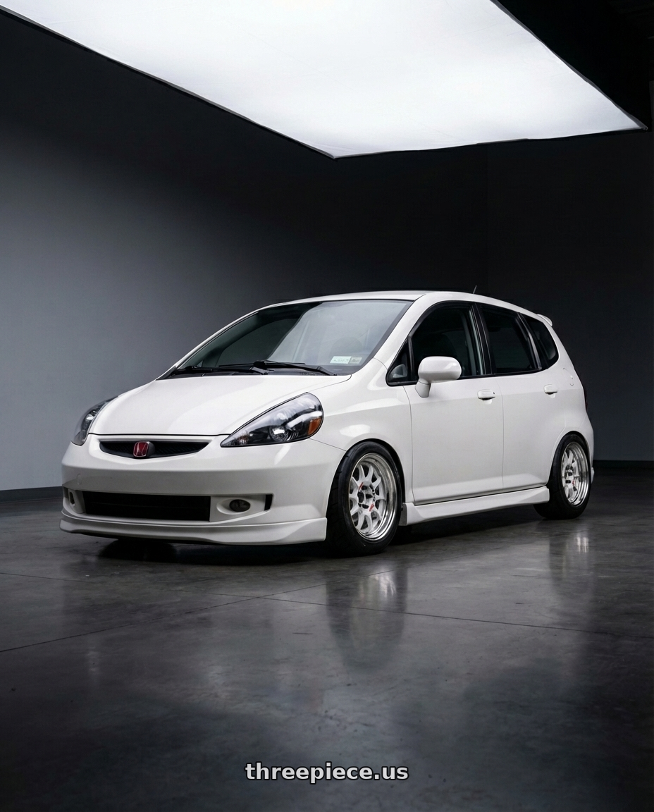 2007 Honda fit  with Work Emotion Rs11 2p 4x100 15x8 30 white wheels