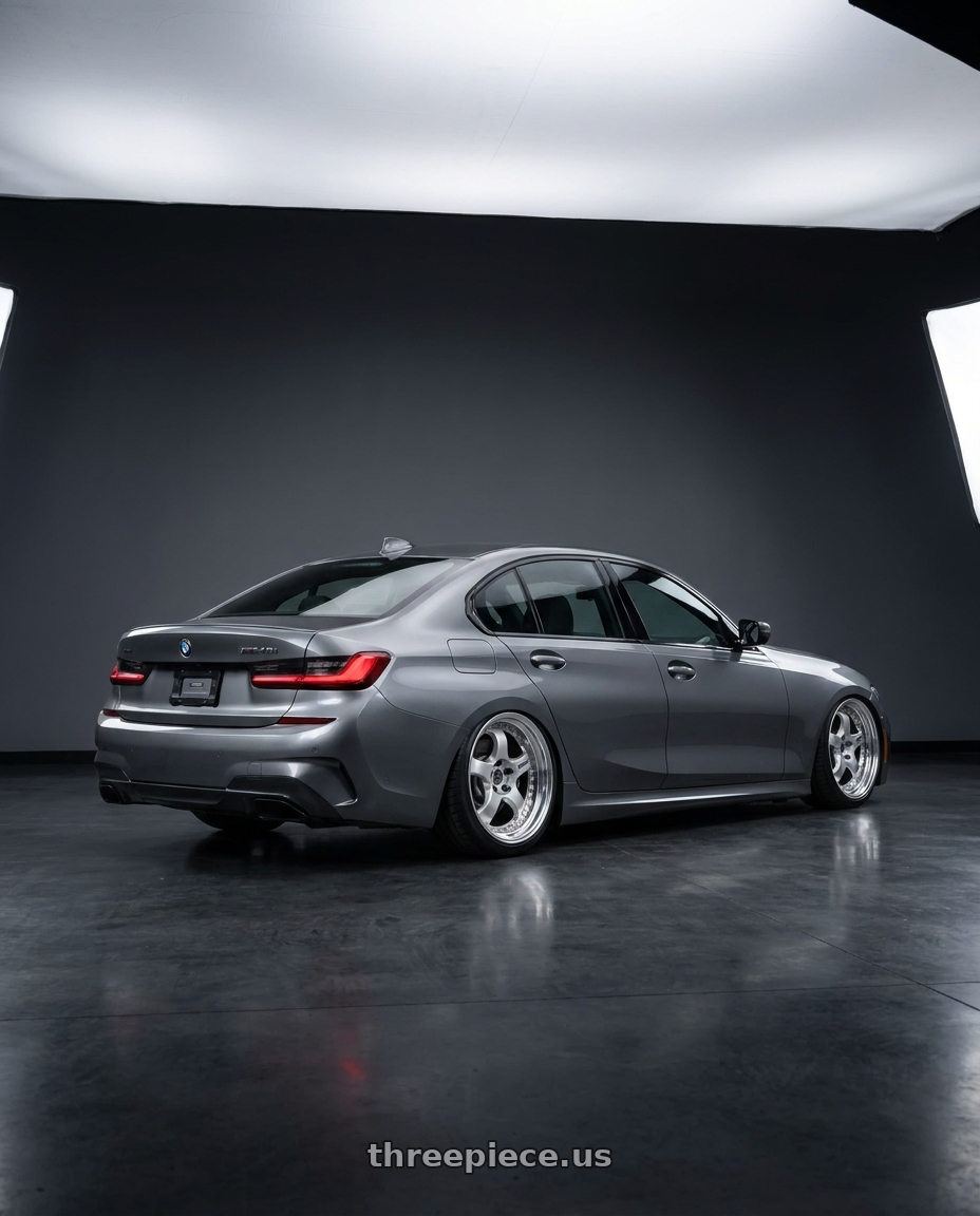 2020 bmw m340i with Work Meister S1 3P 5x112 19x9+44 R Disk Silver wheels rear three quarter view slight stretch tires